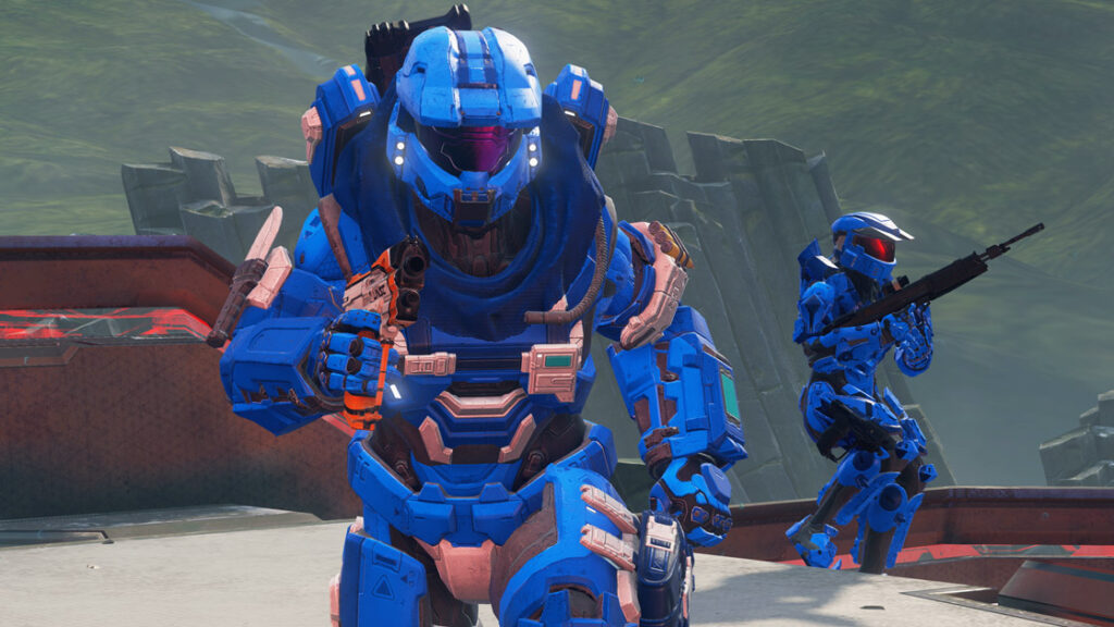Two blue Spartans from Halo 5 run into battle.