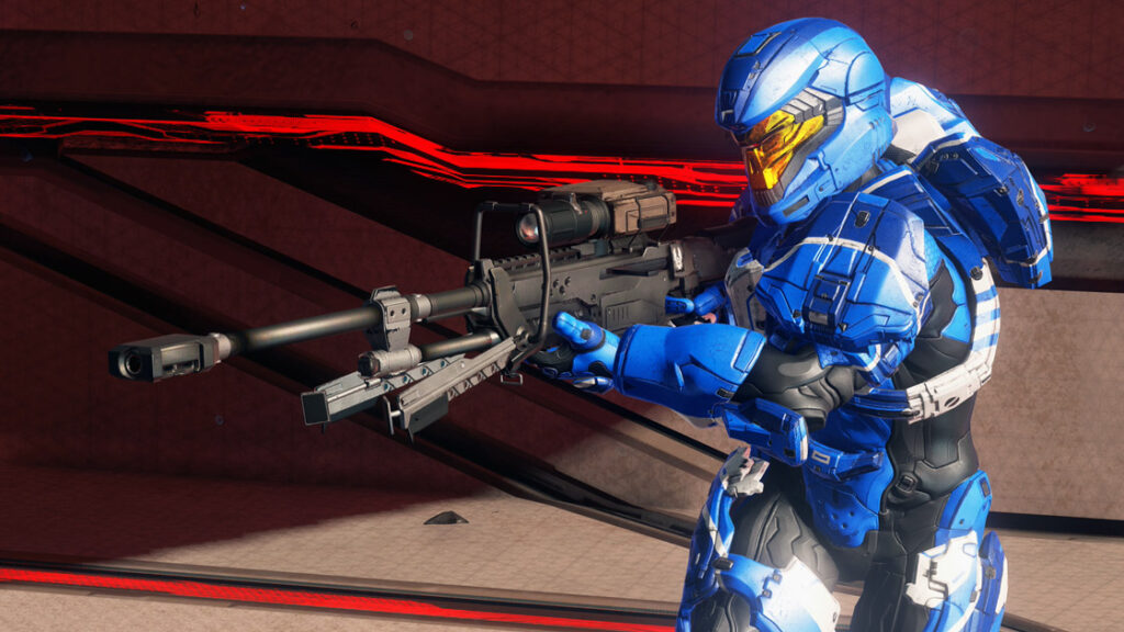 A blue Spartan stands at the ready with a Sniper Rifle.