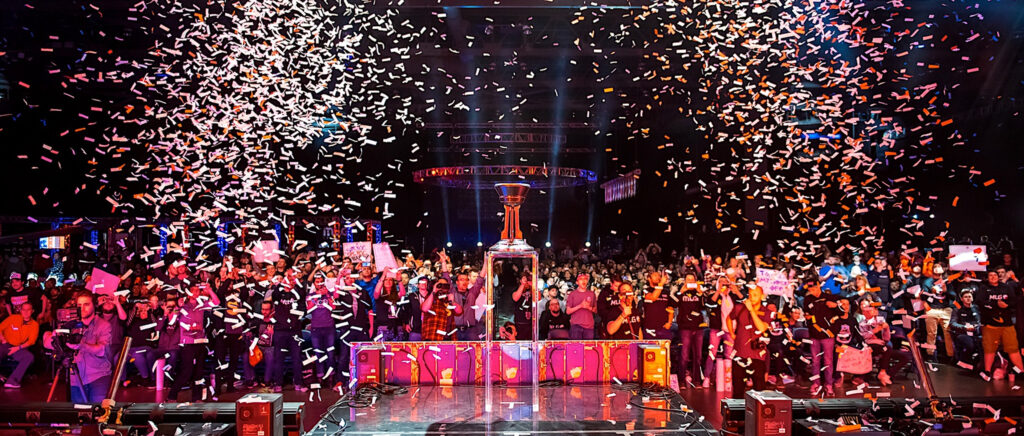 Photo from HaloWC 2018 from the stage looking out into the crowd and trophy as confetti falls to the floor.