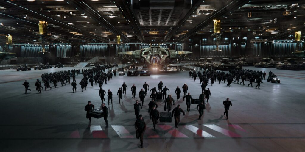 A still of dozens of UNSC troops in a hangar from the first look trailer.