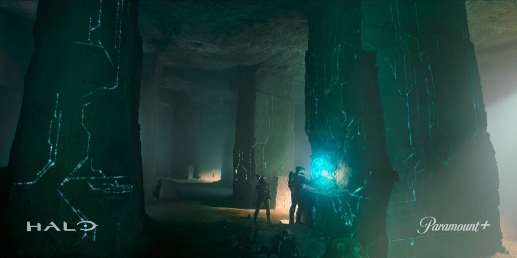 Trailer still of Master Chief in a Forerunner cave.