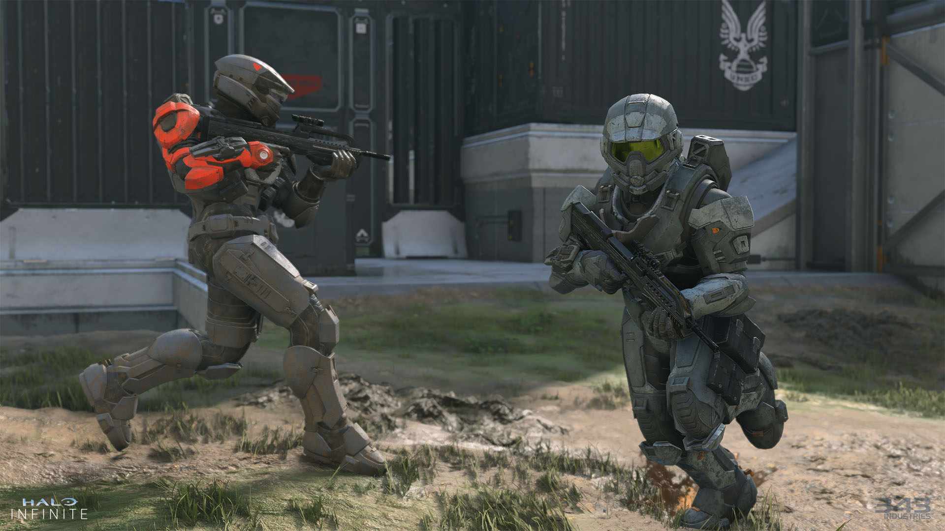 Two multiplayer spartans look for their enemy on the Live Fire map.