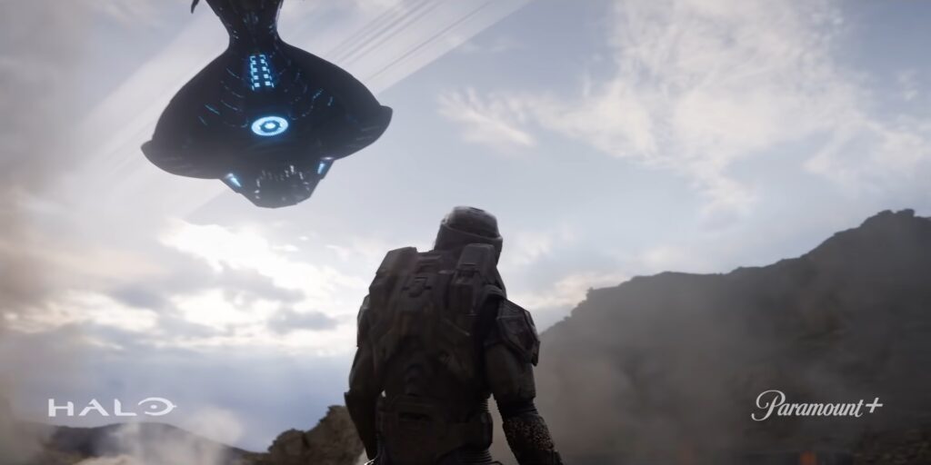 Trailer shot of the Master Chief looking up at a Covenant ship.