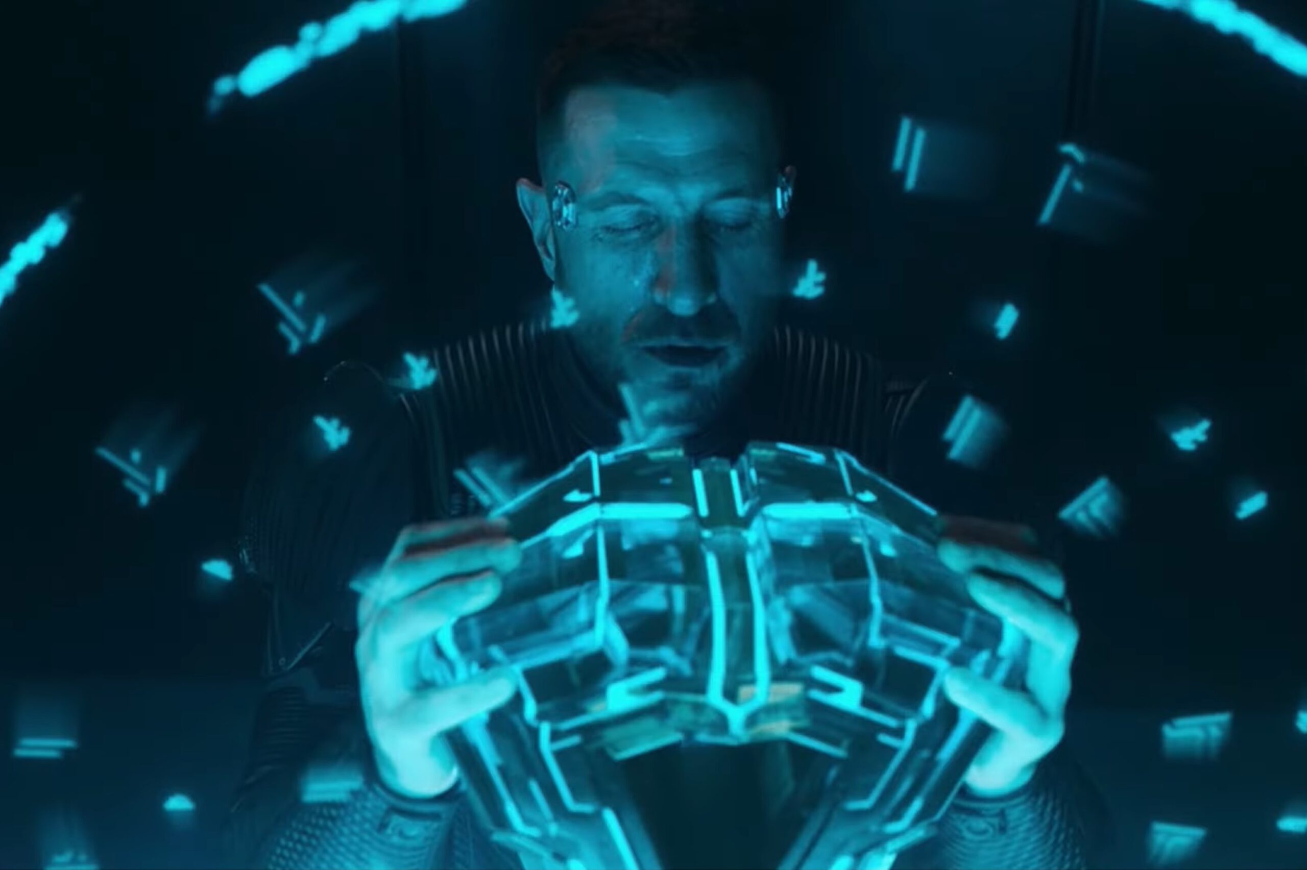 Still of holographic ring appearing around John-117 as he touches the keystone