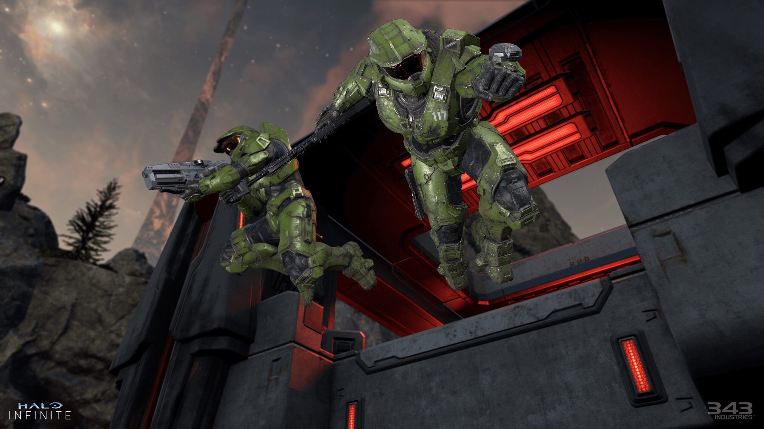 Campaign Co-Op image of two Master Chief's jumping from a Banished structure