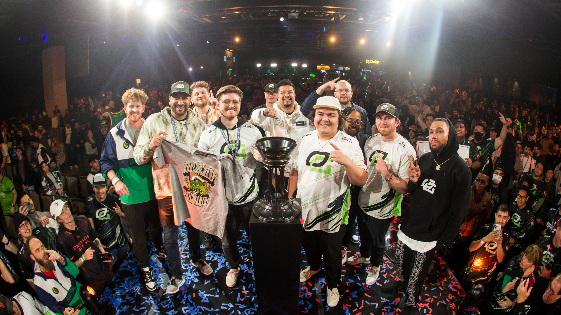 OpTic Gaming 2022 Halo World Champions hoisting trophy on the mainstage