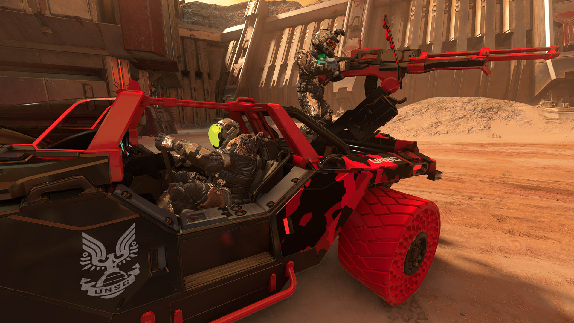 Two Spartans are loaded up in a Warthog on Breaker.