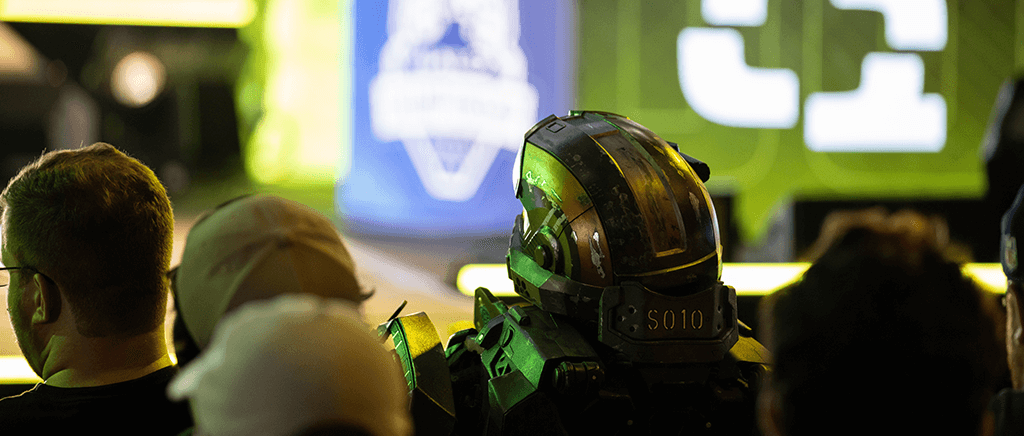 Spartan Cosplayer enjoying Halo Infinite matches in the crowd at an HCS event