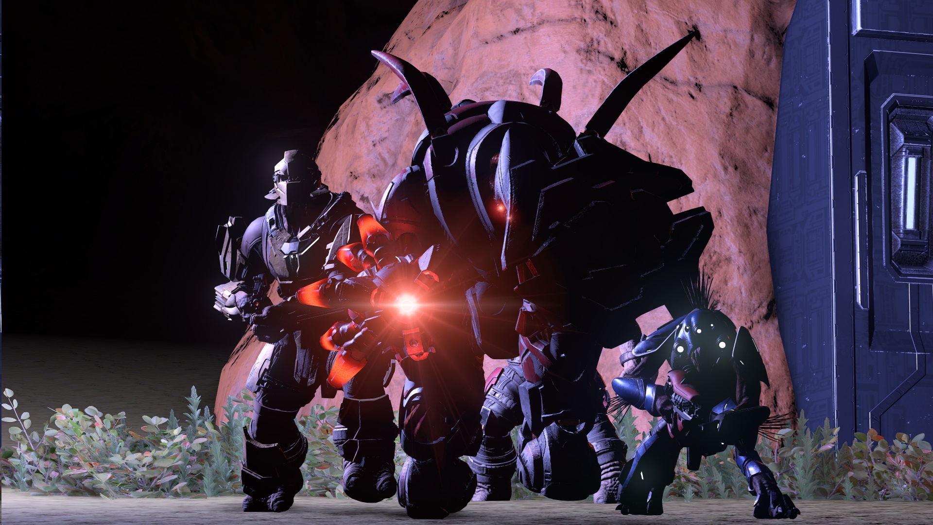 Halo Infinite screenshot of (from left-to-right) a Brute, Hunter, and Jackal on a dark map