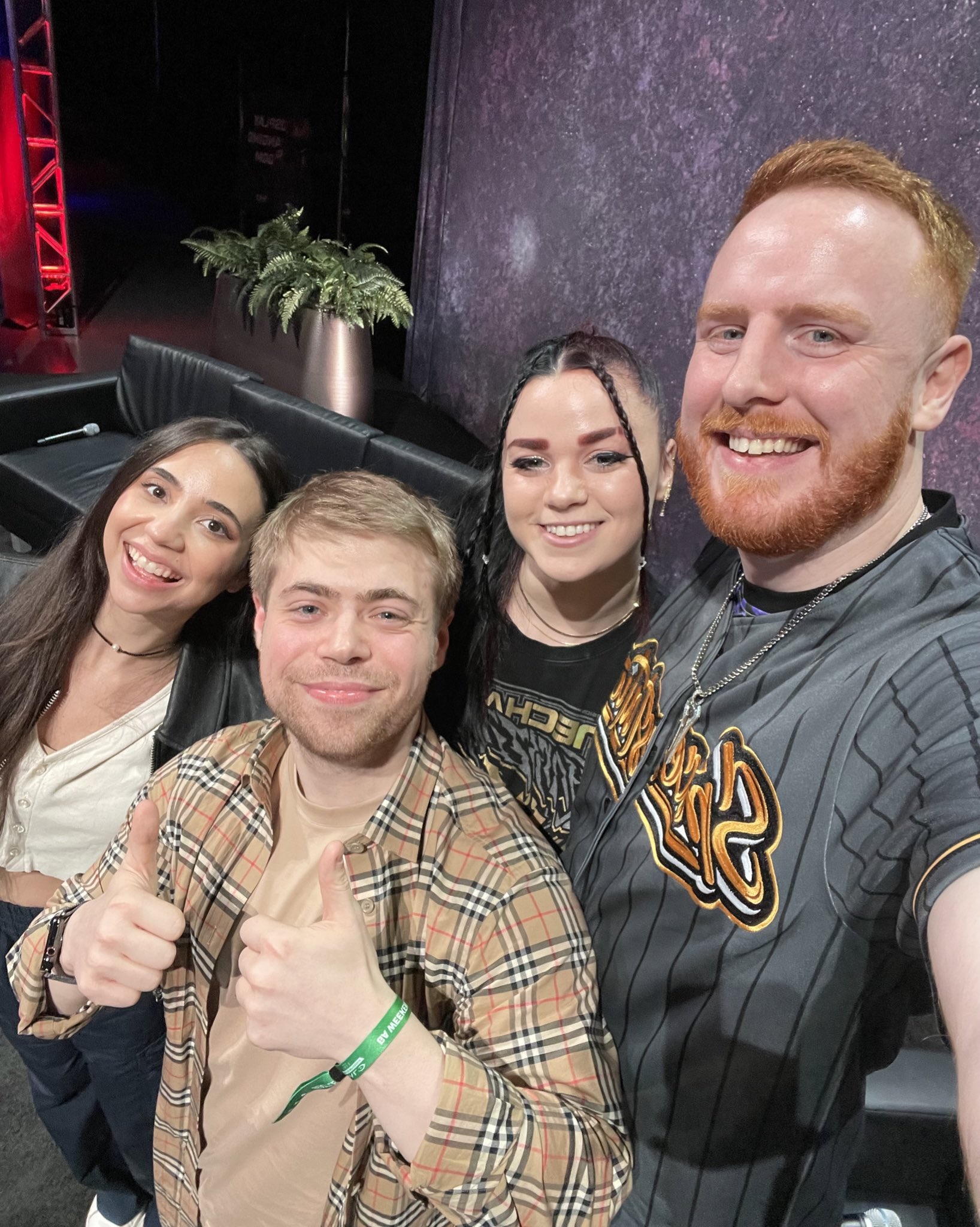 Photograph of Alyek with three big fans of hers on the Halo World Championship's Community Stage (HiddenXperia, Oath, and UberNick)