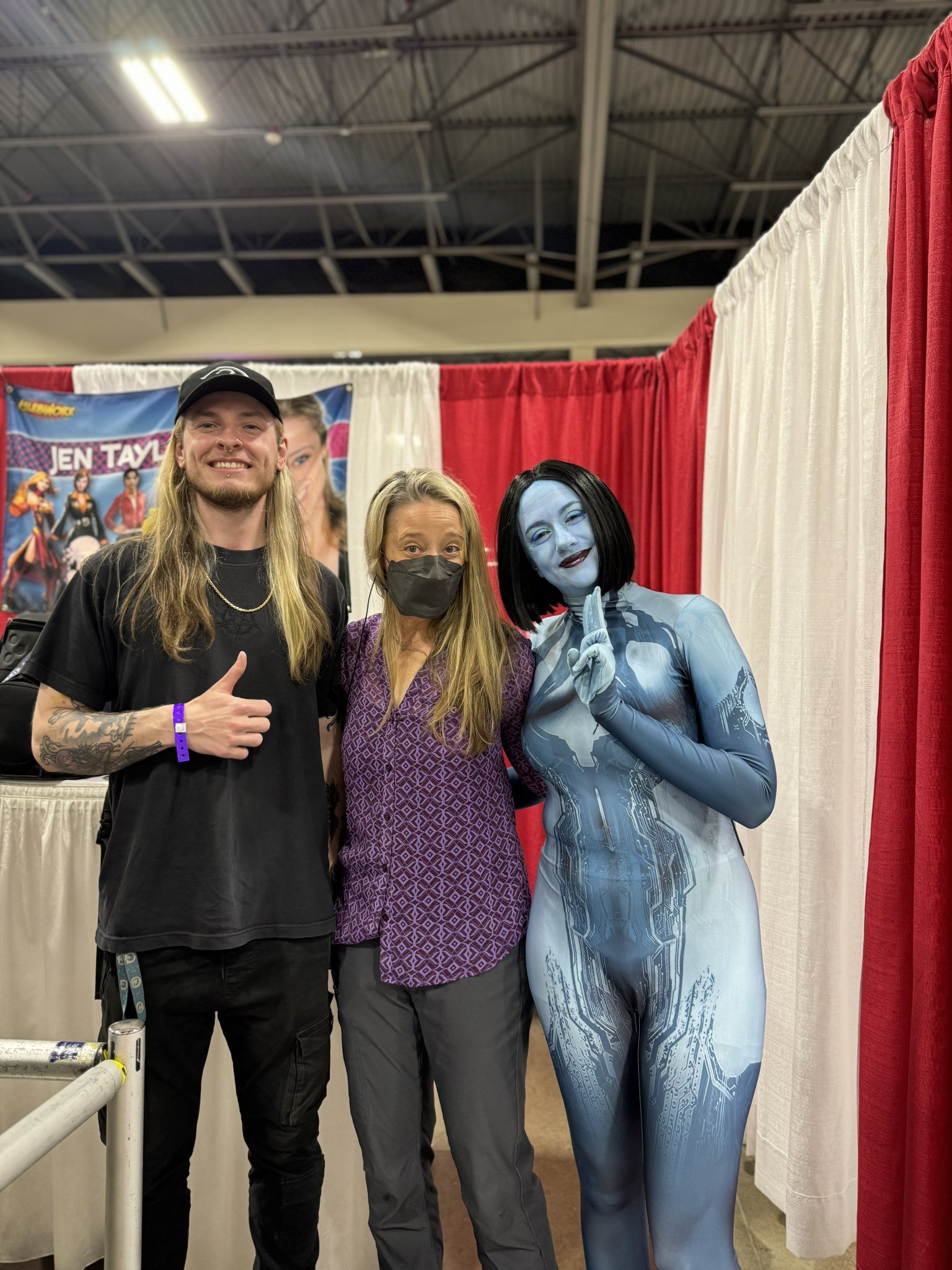 Photo of LaSinity cosplaying as Cortana with her partner "Womp" and Jen Taylor
