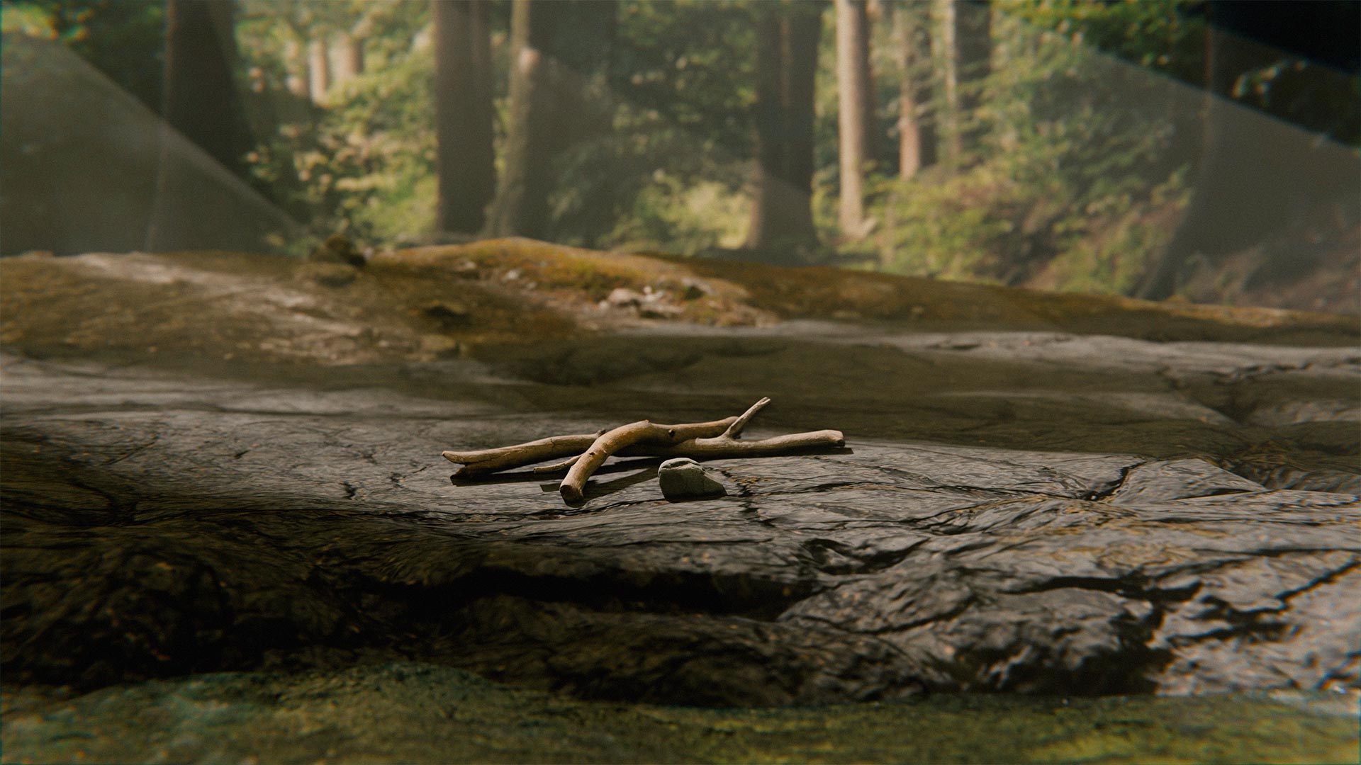 Two sticks and a stone near a quiet stream.