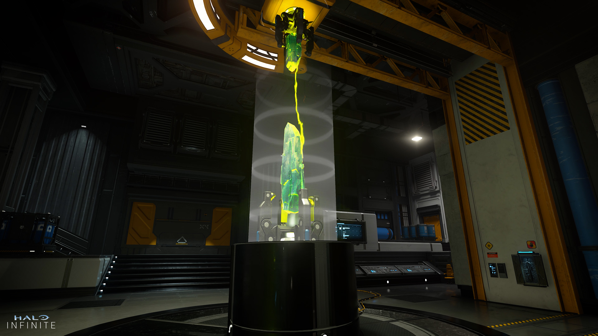 Lattice map. A green crystal emanates light from a pedestal in an industrial research laboratory. Electricity links two severed halves of the large, green shard.