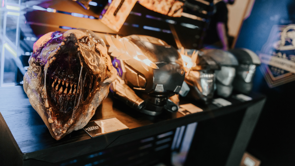 Assortment of fan created helmets at the Maker's Contest booth at the Halo World Championship.