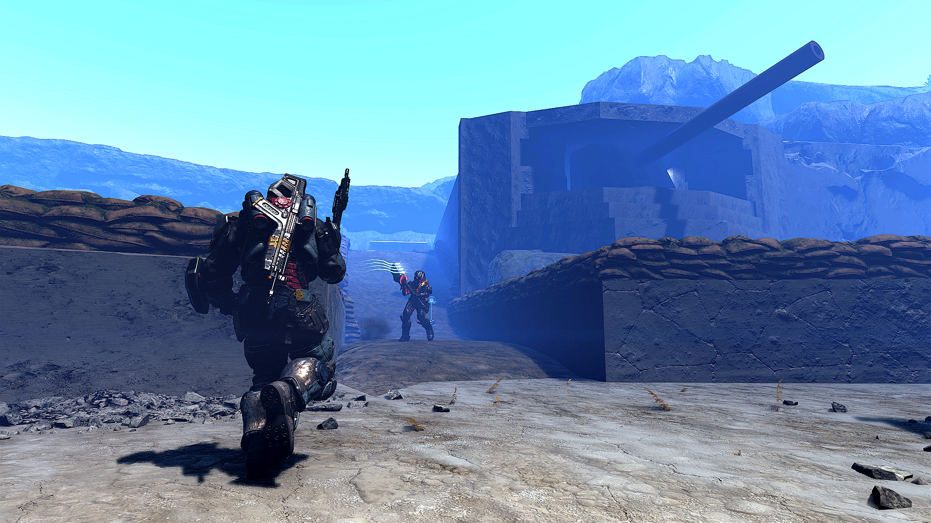 A Spartan holding a Gravity Hammer standing in an access point being charged by another Spartan wielding an Assault Rifle