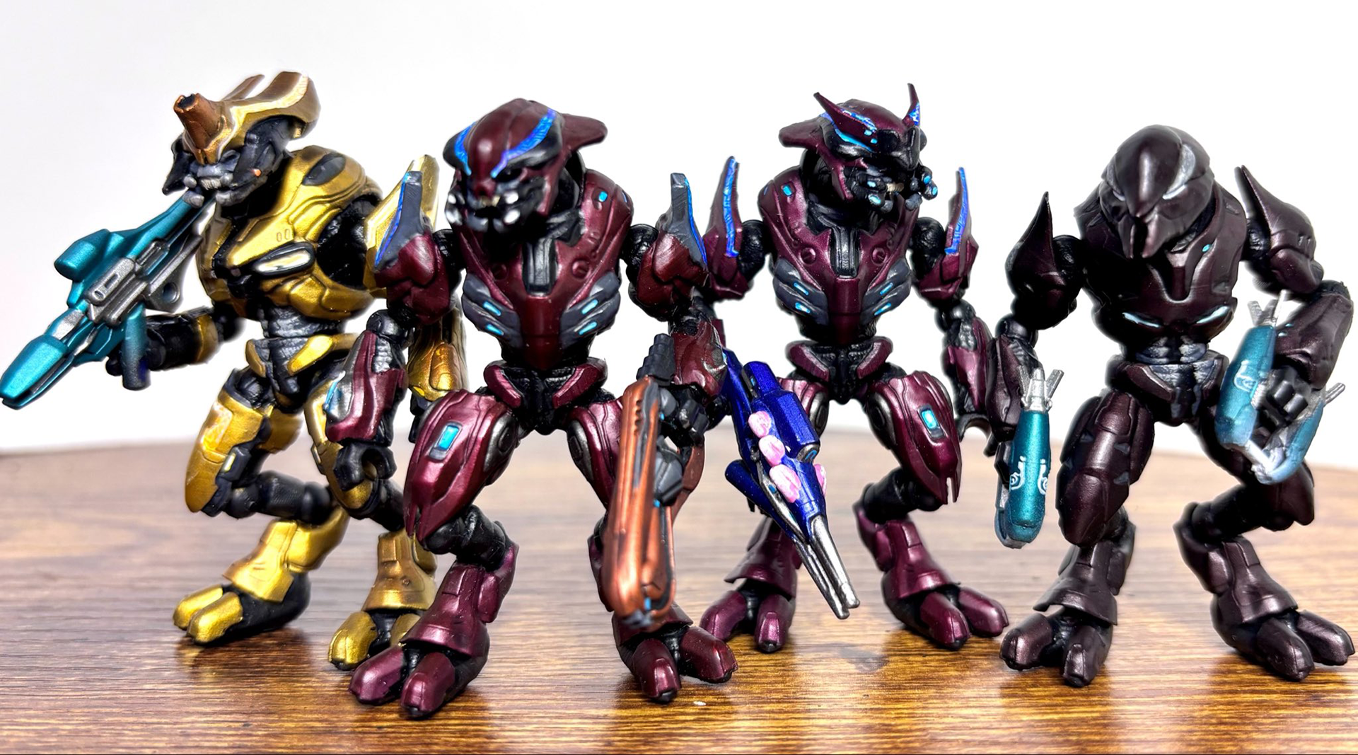 A collection of various Elite miniature figurines.