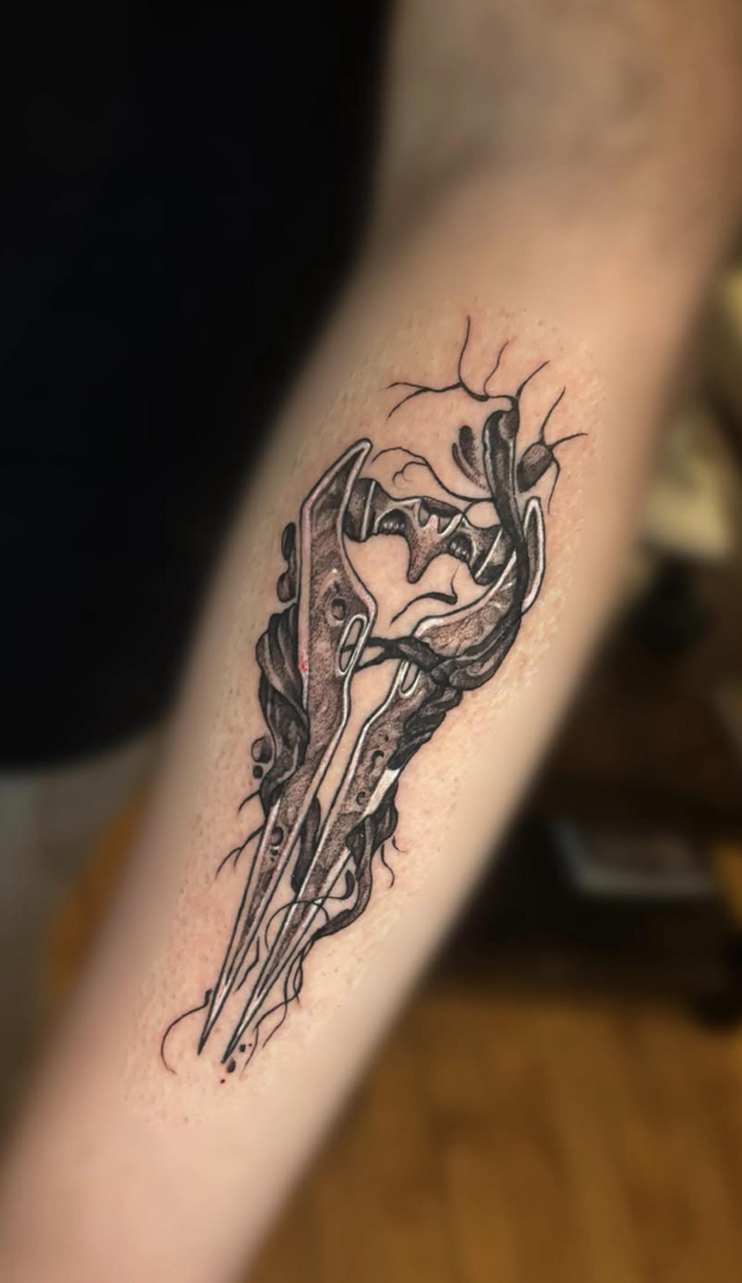 An infected Energy Sword tatoo
