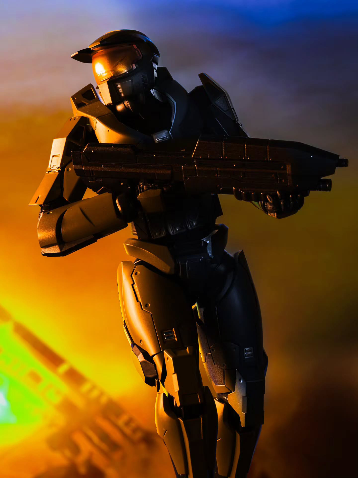 Toy photography by kaminoan_photography. The Master Chief poses with his rifle in a recreation of the Halo 3 box art.